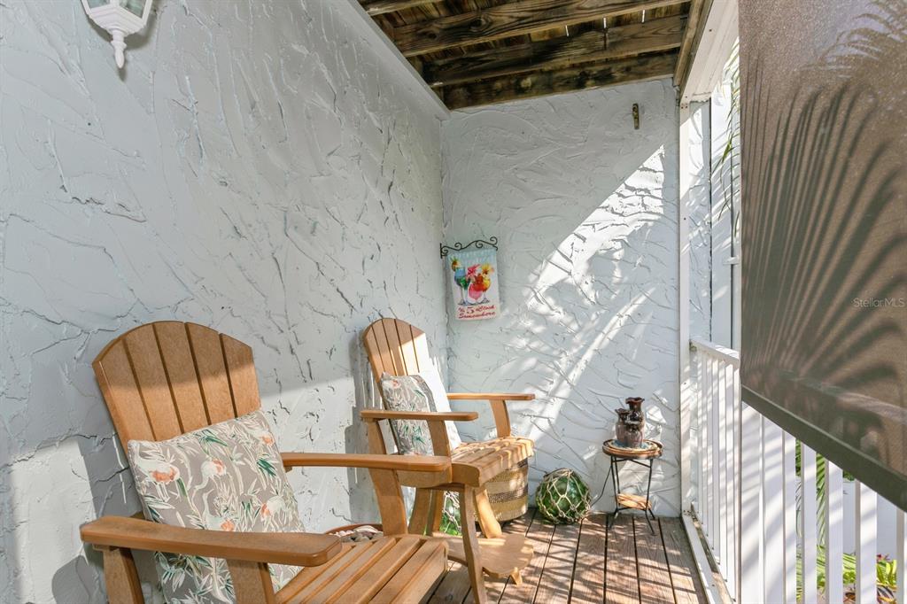 9166 Blind Pass Road St. Pete Beach, FL 33706 - Photo 27 of 37 a view of balcony and deck