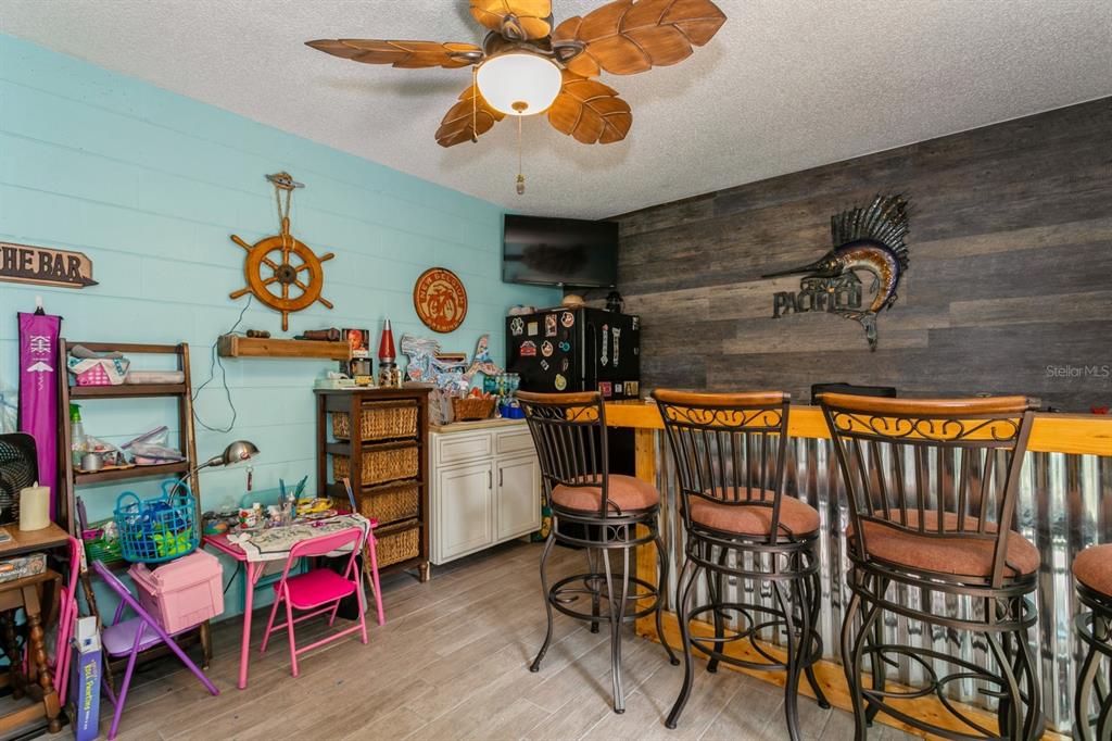 9166 Blind Pass Road St. Pete Beach, FL 33706 - Photo 29 of 37 a view of a room with gym equipment