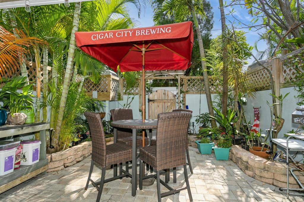9166 Blind Pass Road St. Pete Beach, FL 33706 - Photo 32 of 37 an outdoor space with furniture