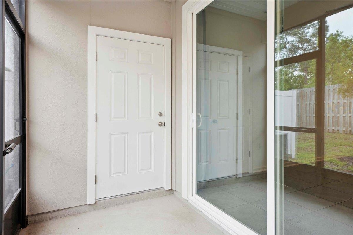 180 Stonegate Avenue St. Augustine, FL 32084 - Photo 6 of 38 a view of a bathroom with a glass door