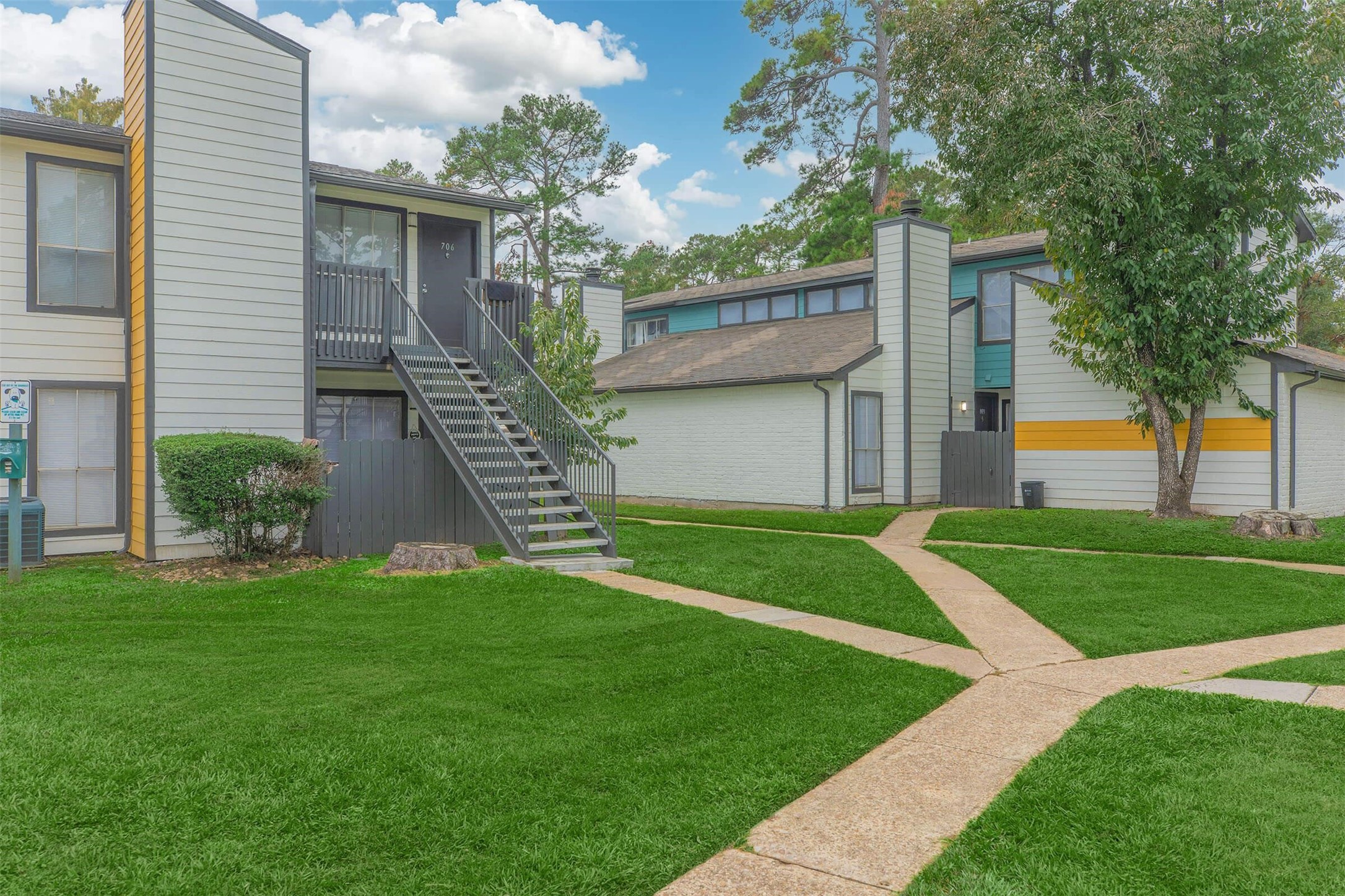 21717 Inverness Forest Boulevard, Unit 1911 Houston, TX 77073 - Photo 15 of 29 a house view with a garden space