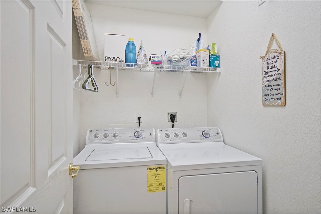 9070 Water Tupelo Road Fort Myers, FL 33912 - Photo 21 of 29 a utility room with dryer and washer
