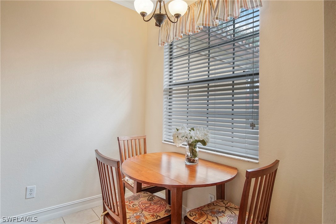 9070 Water Tupelo Road Fort Myers, FL 33912 - Photo 10 of 29 a bathroom with a sink and a mirror