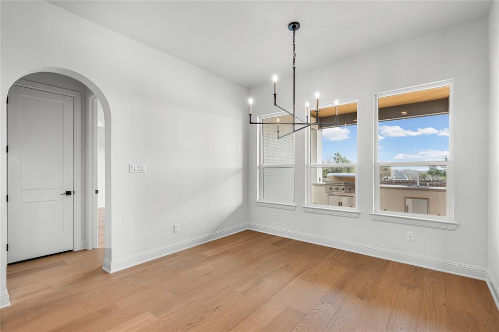 4720 Magnolia Trail Midlothian, TX 76065 - Photo 10 of 40 a view of empty room with wooden floor and window