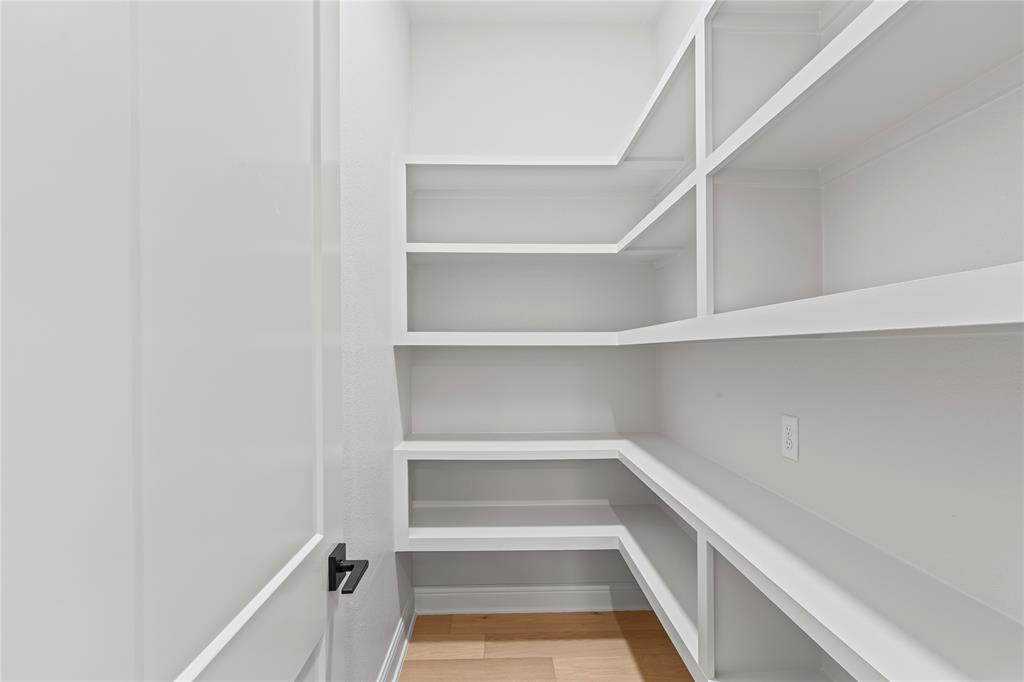 4720 Magnolia Trail Midlothian, TX 76065 - Photo 17 of 40 a view of walk in closet with empty racks