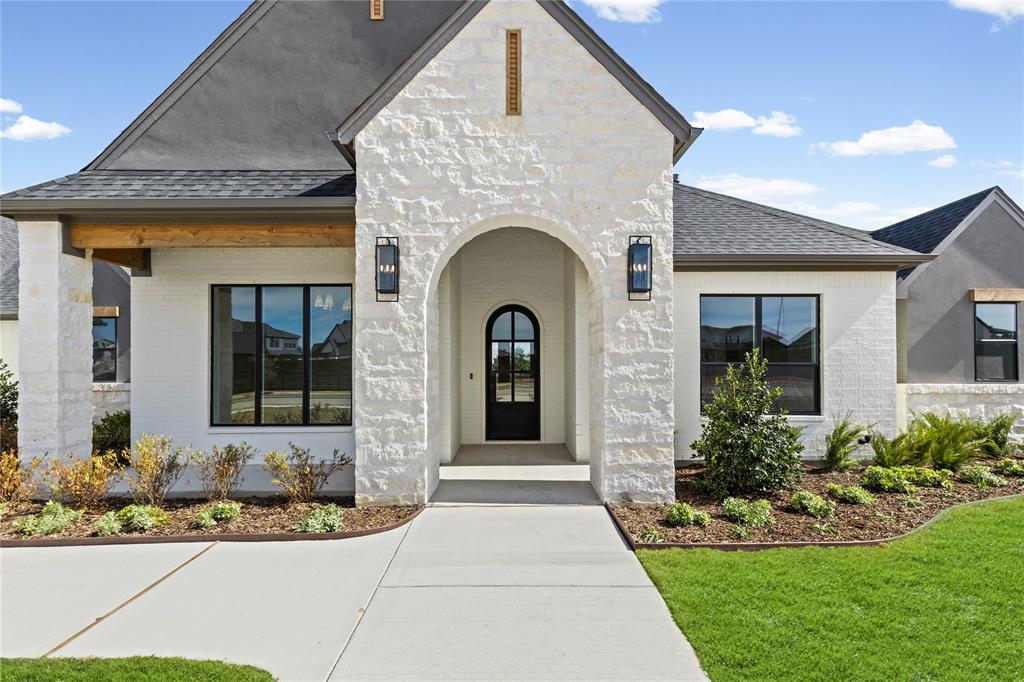 4720 Magnolia Trail Midlothian, TX 76065 - Photo 4 of 40 a front view of a house with garden