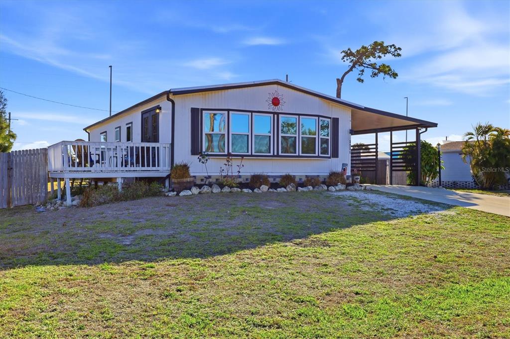 3225 Towhee Street Englewood, FL 34224 - Photo 1 of 1 a view of a house with a yard