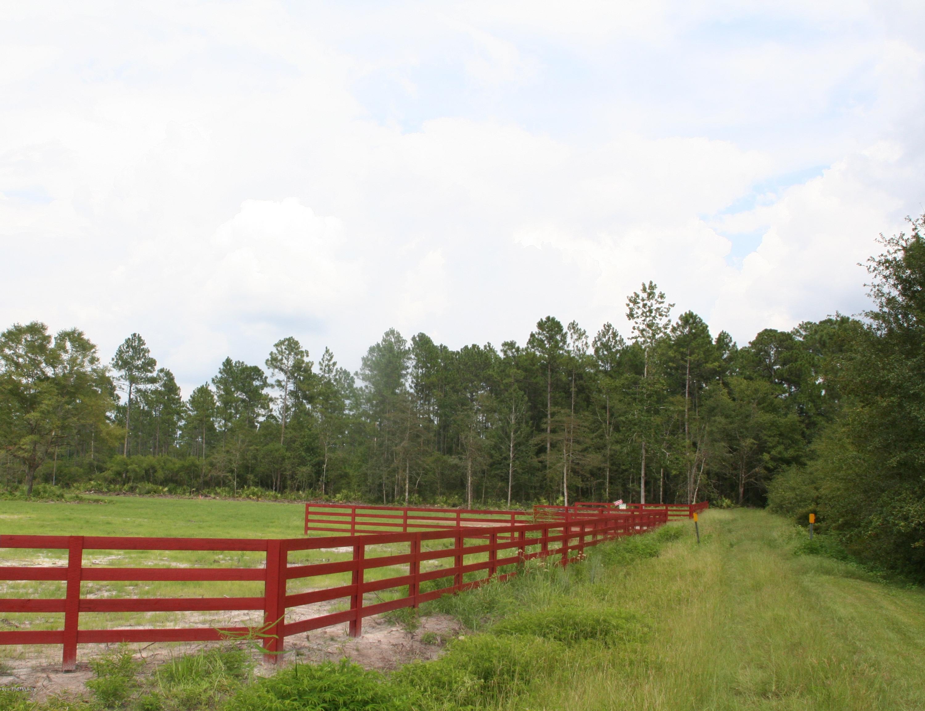 511 Randy Road Yulee, FL 32097 - Photo 3 of 10 a view of a park with large trees