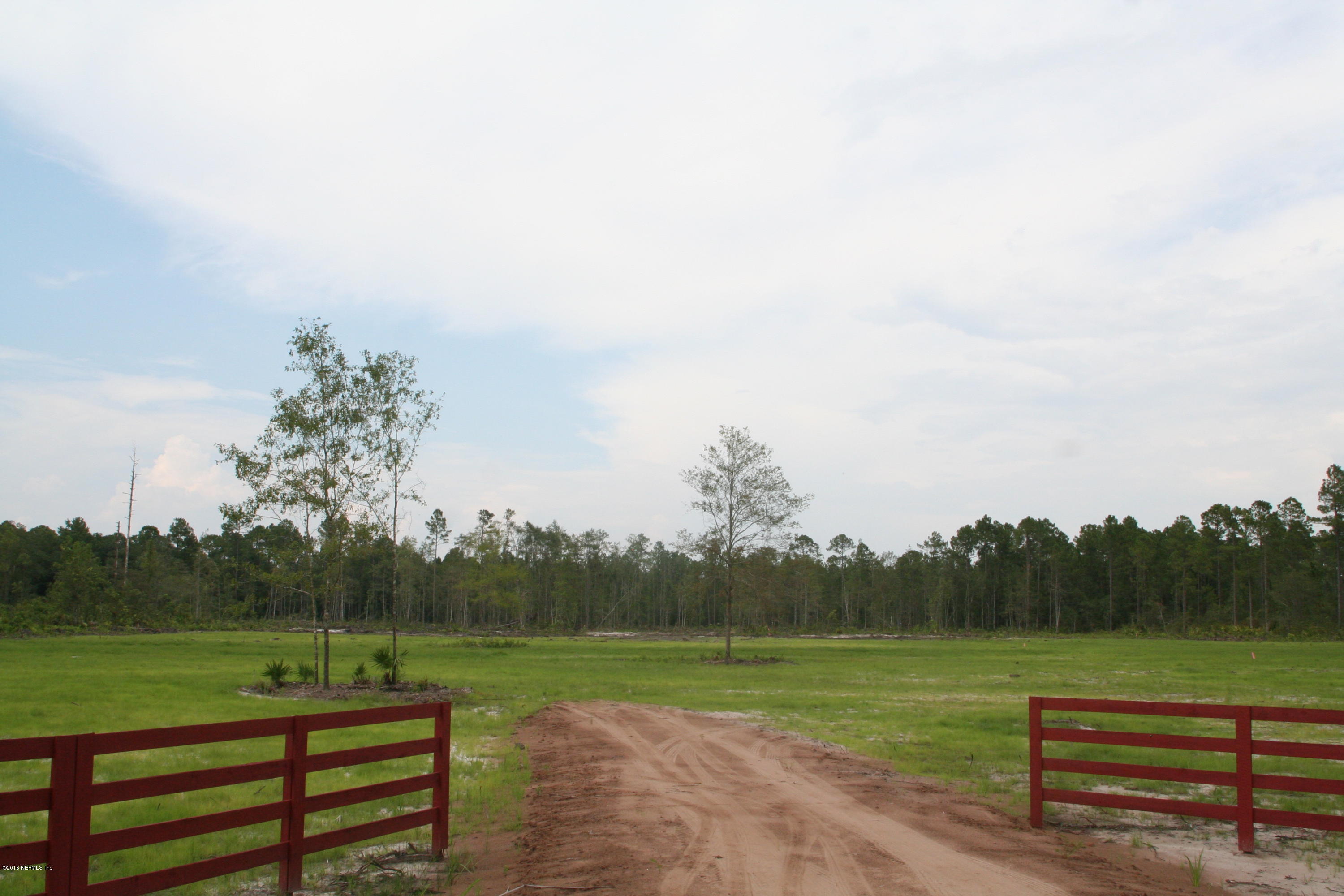 511 Randy Road Yulee, FL 32097 - Photo 9 of 10 a view of a park with large trees