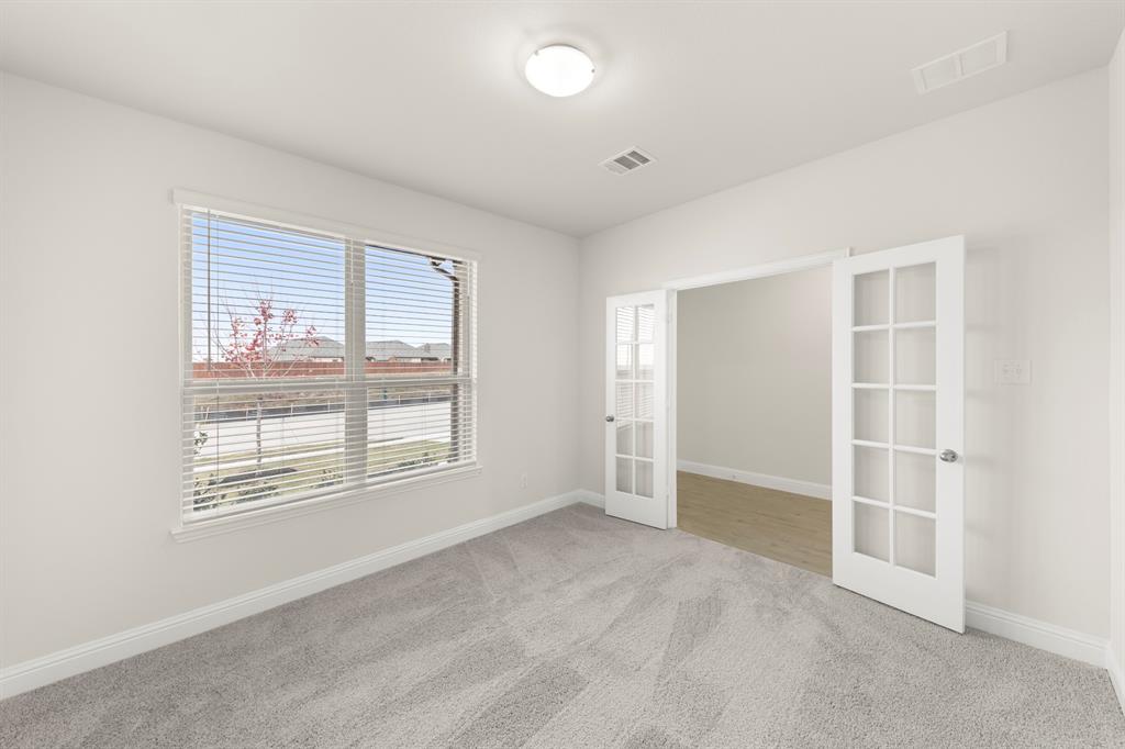 2029 Gladd Road Royse City, TX 75189 - Photo 12 of 27 an empty room with windows