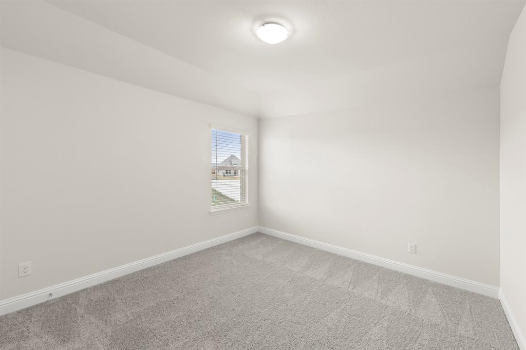 2029 Gladd Road Royse City, TX 75189 - Photo 21 of 27 an empty room with a empty space and window
