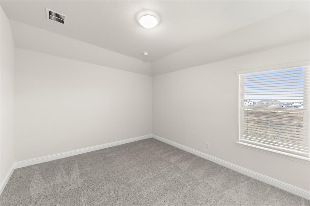 2029 Gladd Road Royse City, TX 75189 - Photo 24 of 27 an empty room with a window