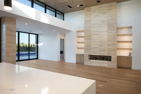 a view of a kitchen with large window