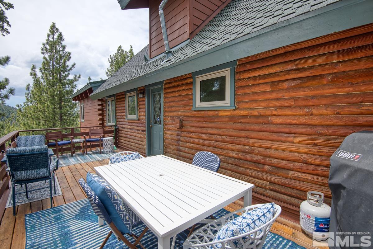 618 Jeff Lane Stateline, NV 89449 - Photo 11 of 37 a wooden bench sitting in front of a building