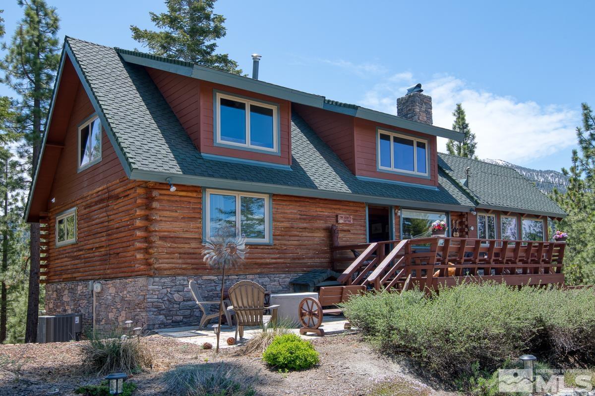 618 Jeff Lane Stateline, NV 89449 - Photo 4 of 37 a front view of a house with garden