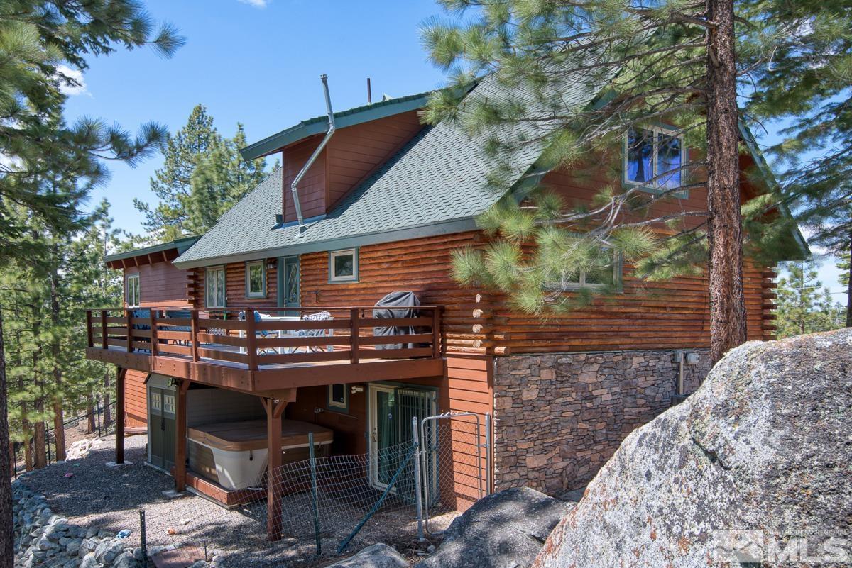 618 Jeff Lane Stateline, NV 89449 - Photo 6 of 37 a view of a chairs and table in the backyard
