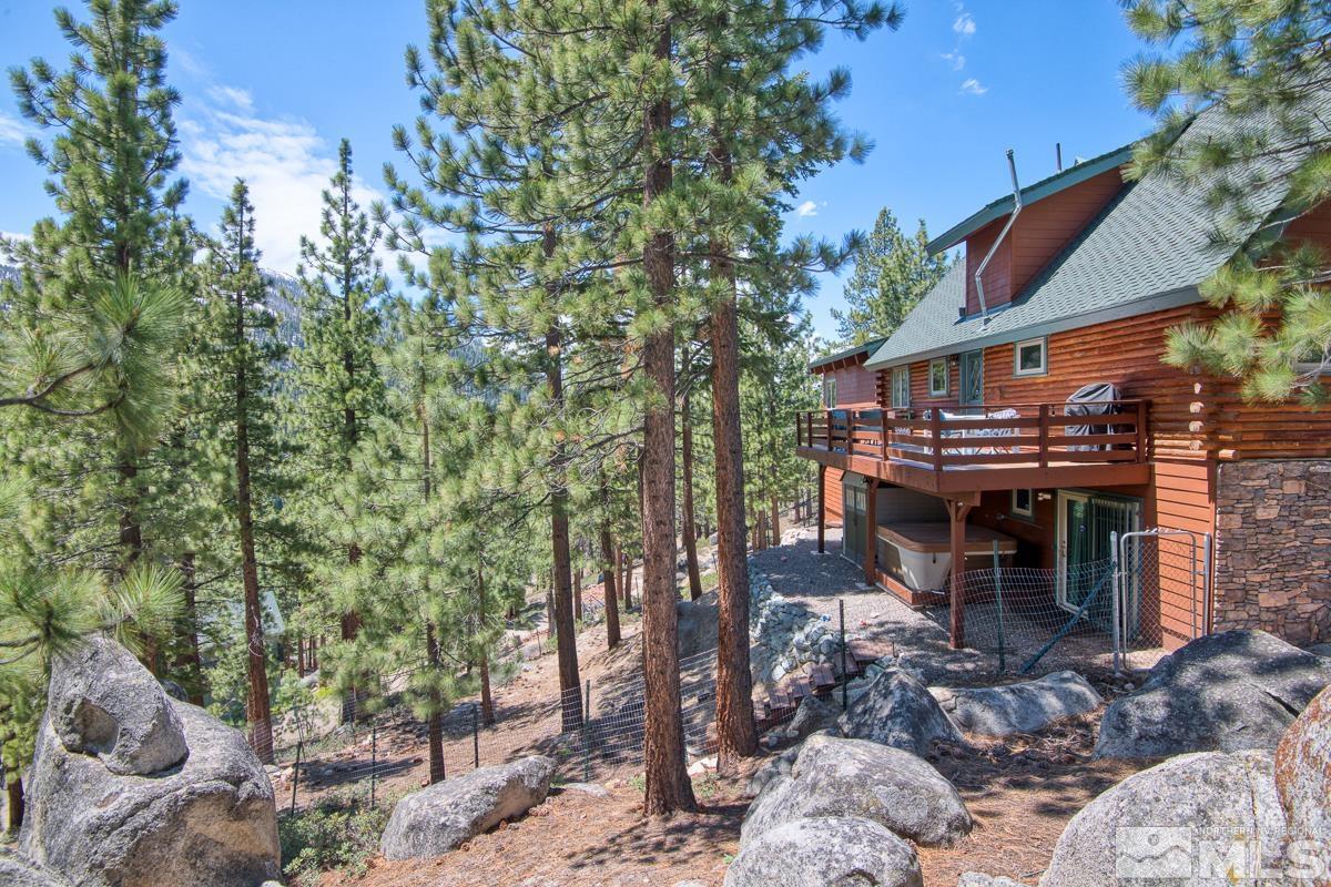 618 Jeff Lane Stateline, NV 89449 - Photo 7 of 37 a front view of a house with a garden