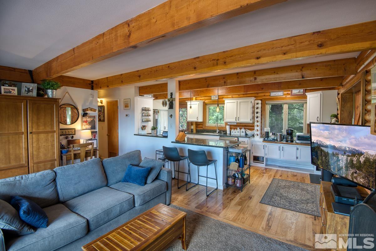 618 Jeff Lane Stateline, NV 89449 - Photo 9 of 37 a living room with furniture and a fireplace
