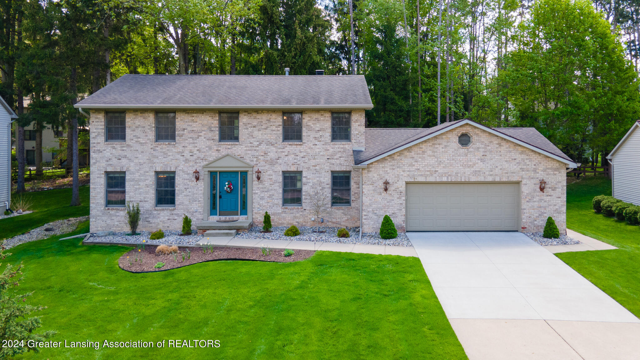 3933 West Herbison Road Dewitt, MI 48820 - Photo 1 of 56 3933_W_Herbison_BROCK-16