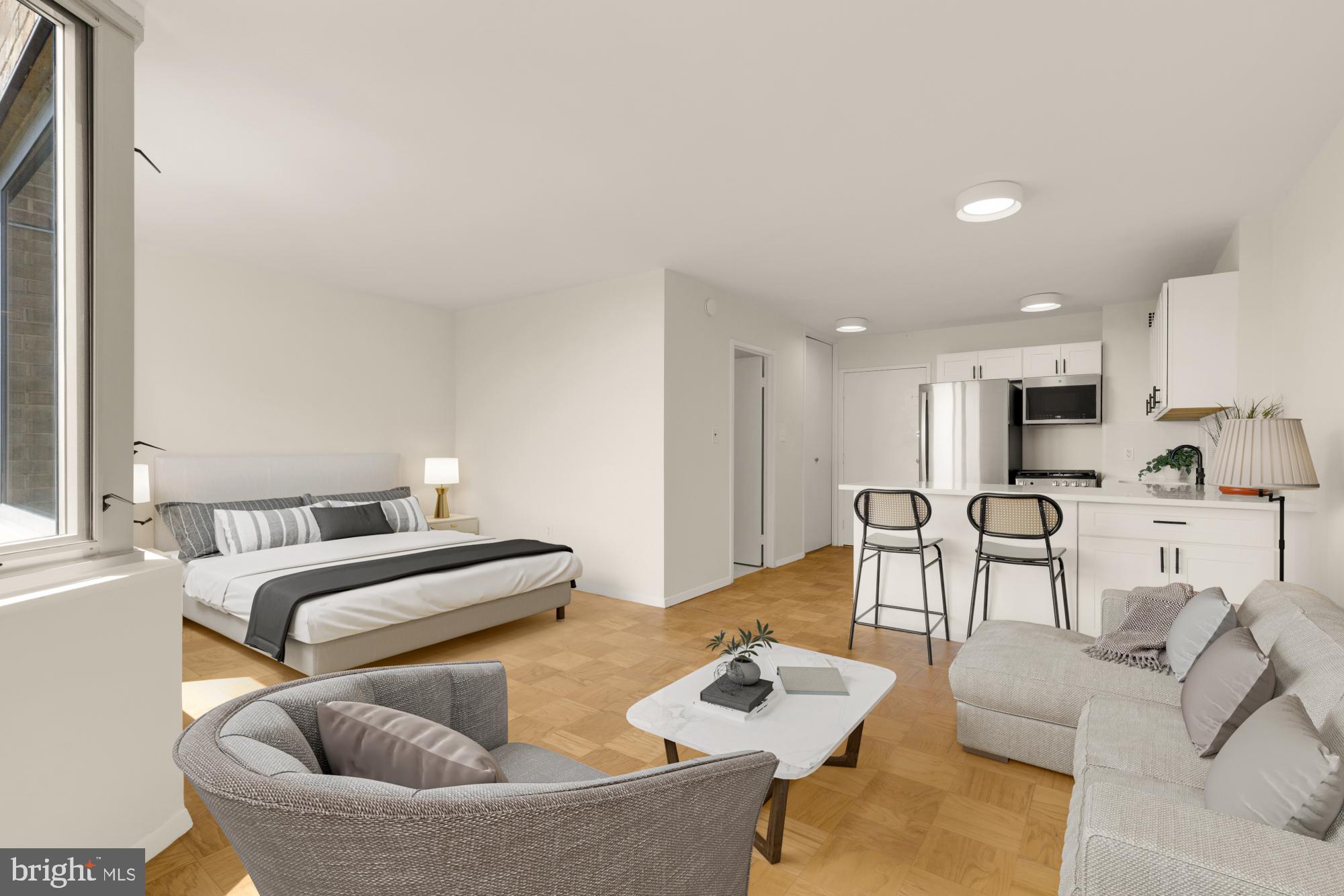 2800 Wisconsin Avenue Northwest, Unit 609 Washington, DC 20007 - Photo 16 of 20 a living room with furniture and a table