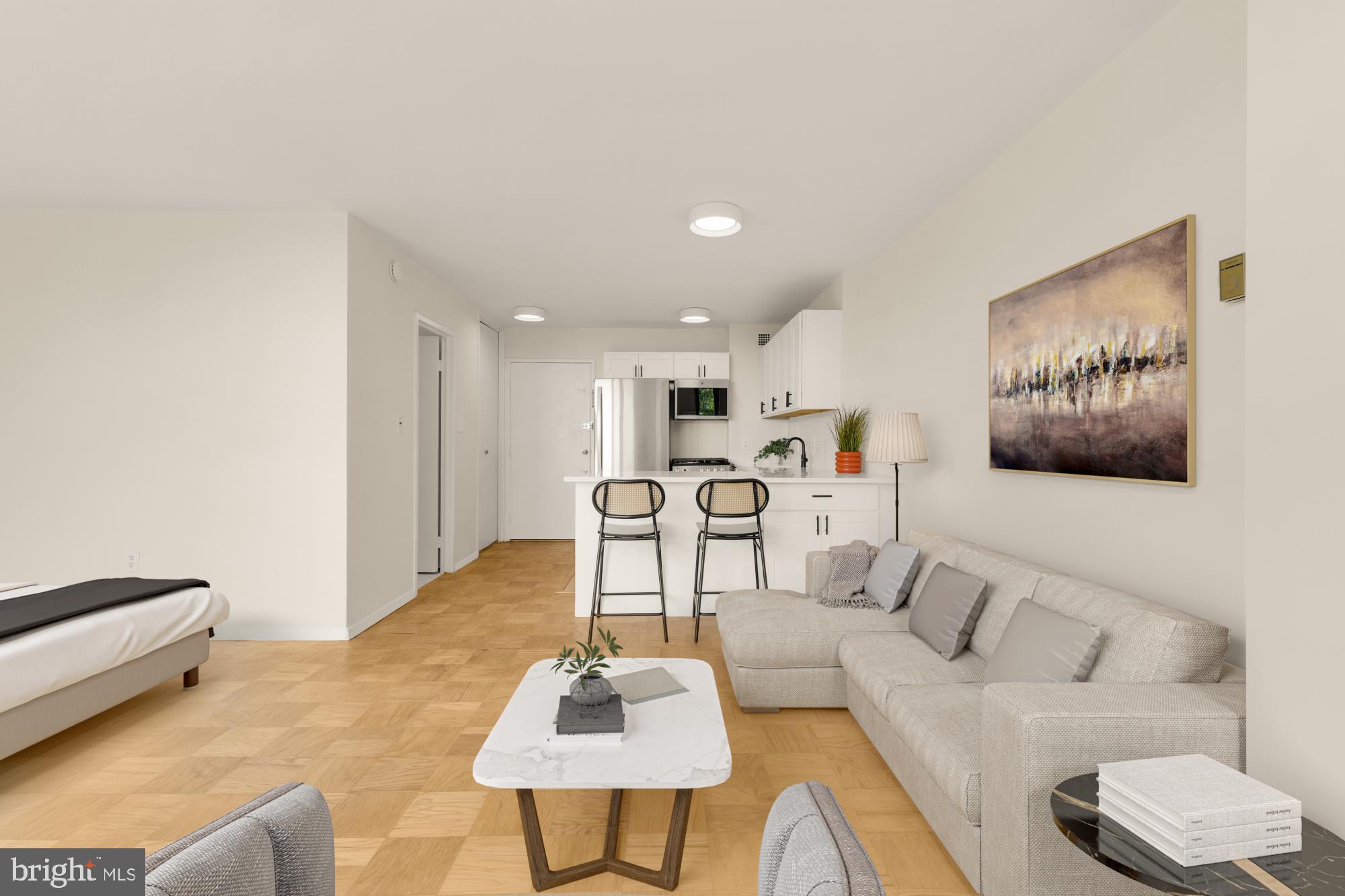 2800 Wisconsin Avenue Northwest, Unit 609 Washington, DC 20007 - Photo 17 of 20 a living room with furniture and a table