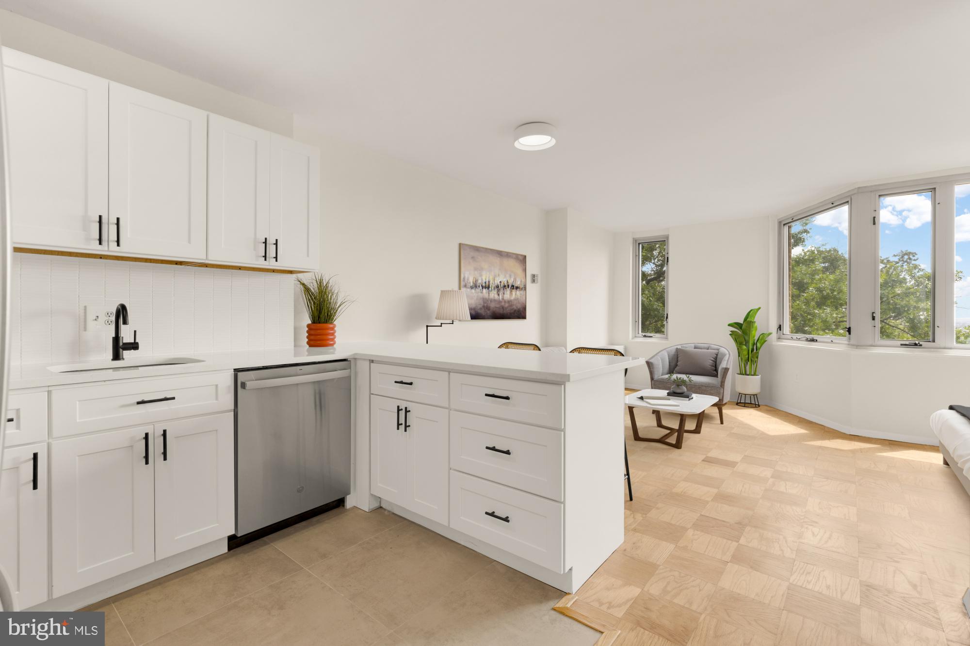 2800 Wisconsin Avenue Northwest, Unit 609 Washington, DC 20007 - Photo 4 of 20 a kitchen with white cabinets and white appliances