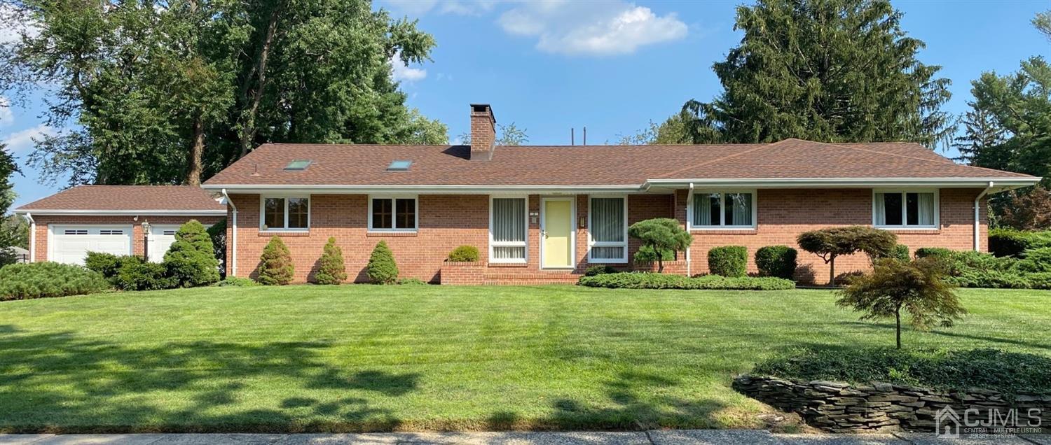2 O Brien Road Cranbury, NJ 08512 - Photo 1 of 35 a front view of a house with a yard porch and sitting area