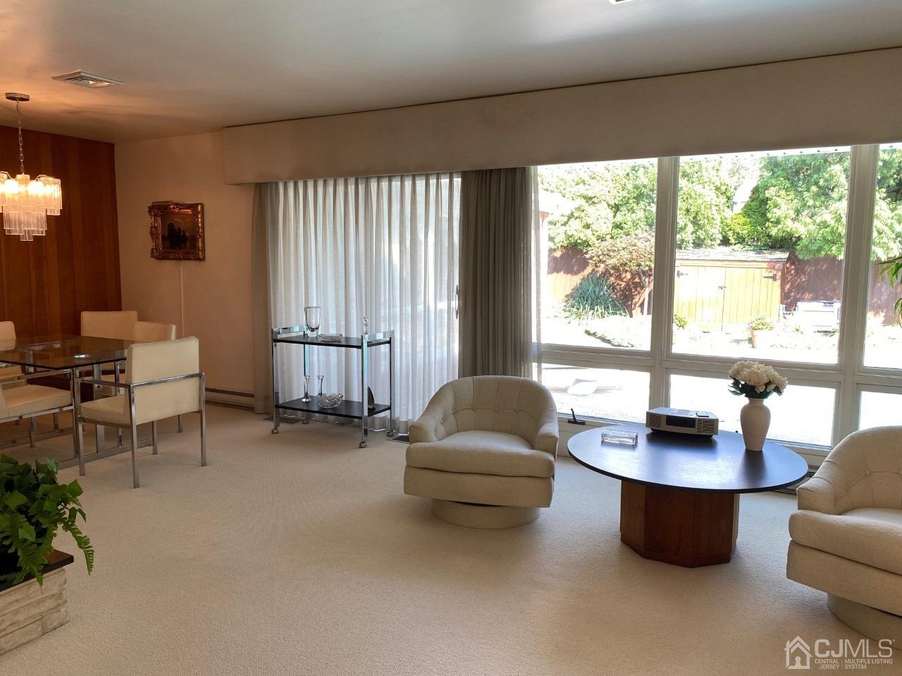 2 O Brien Road Cranbury, NJ 08512 - Photo 11 of 35 a living room with furniture and a large window