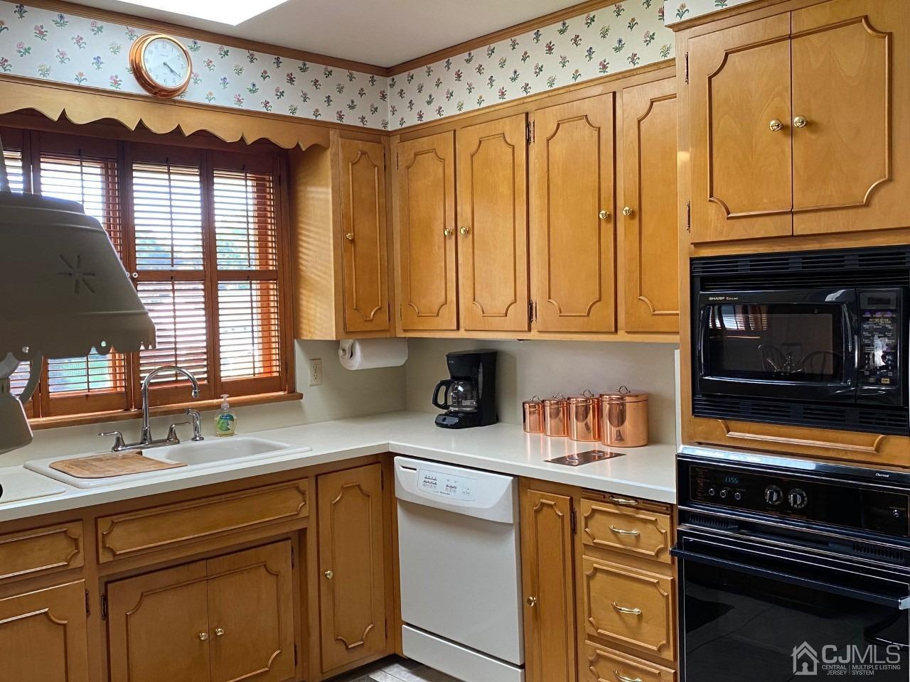 2 O Brien Road Cranbury, NJ 08512 - Photo 21 of 35 a kitchen with stainless steel appliances granite countertop a sink and cabinets
