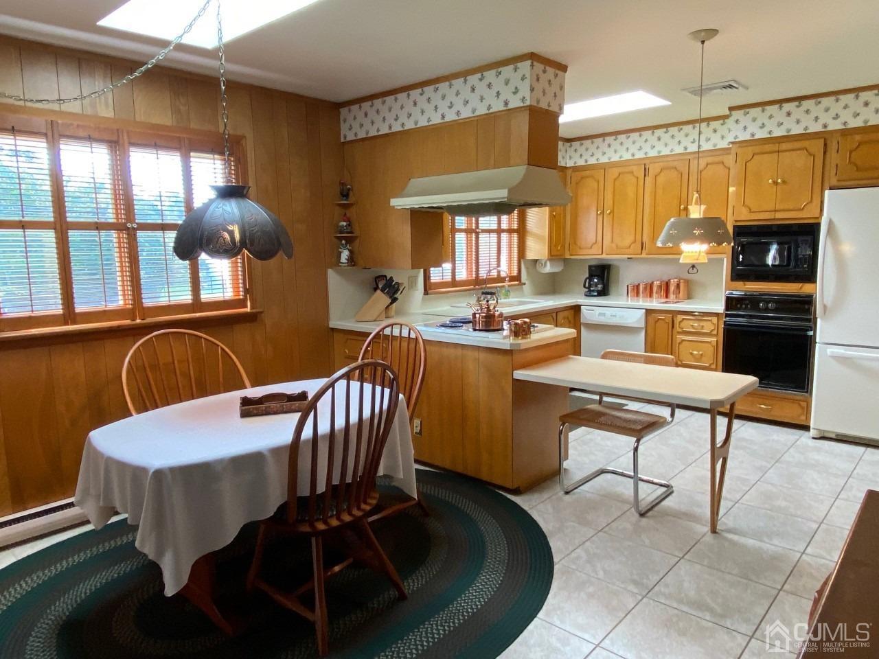 2 O Brien Road Cranbury, NJ 08512 - Photo 22 of 35 a view of a dining room with furniture window and outside view
