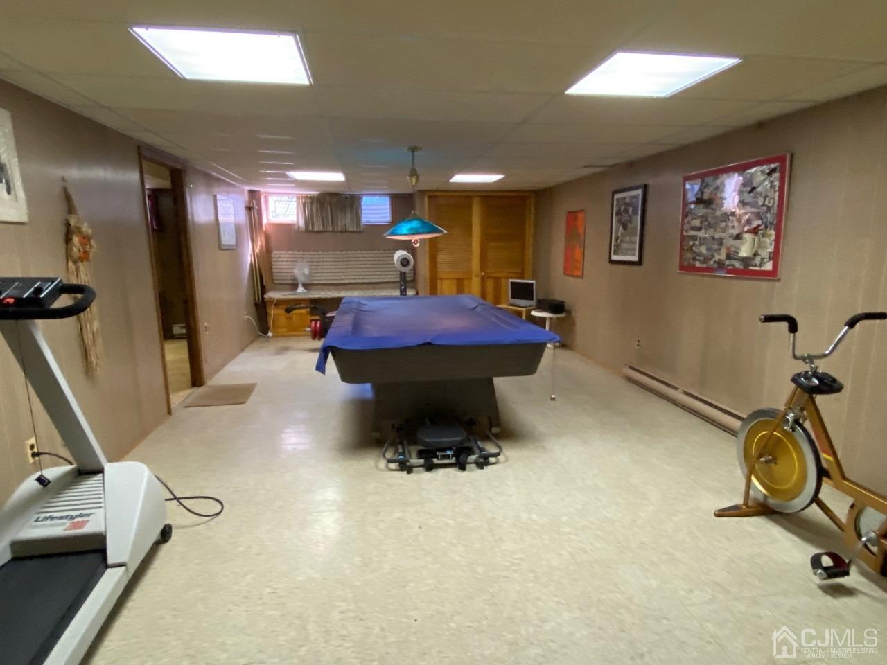 2 O Brien Road Cranbury, NJ 08512 - Photo 25 of 35 a room with gym equipment and a table