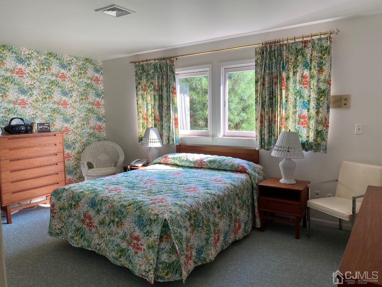 2 O Brien Road Cranbury, NJ 08512 - Photo 26 of 35 a bedroom with a bed window and a couch