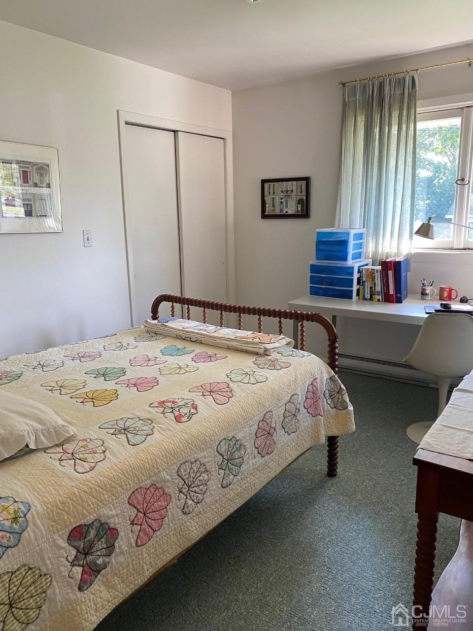 2 O Brien Road Cranbury, NJ 08512 - Photo 30 of 35 a bedroom with a bed and window