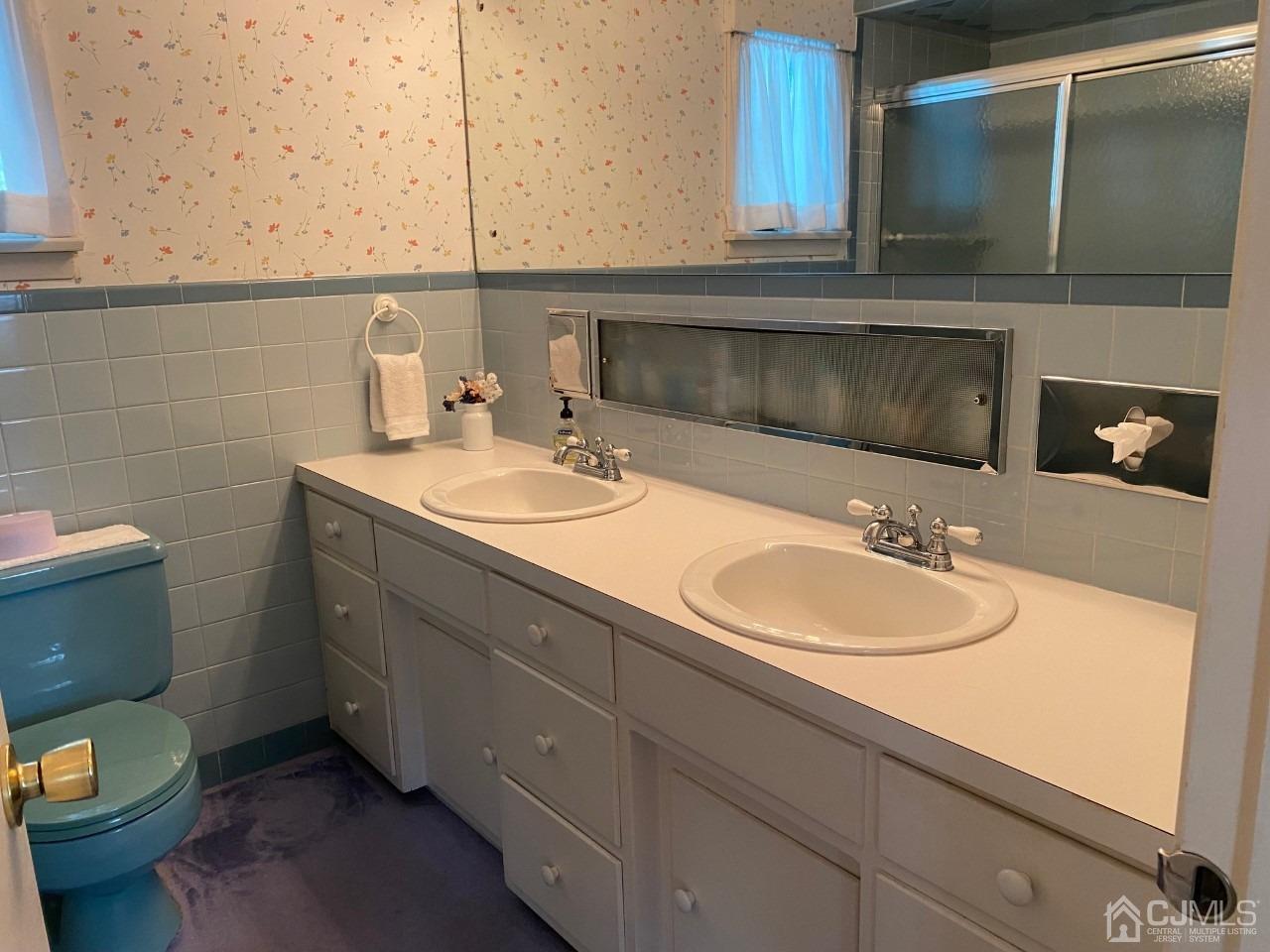 2 O Brien Road Cranbury, NJ 08512 - Photo 31 of 35 a bathroom with a sink and a toilet