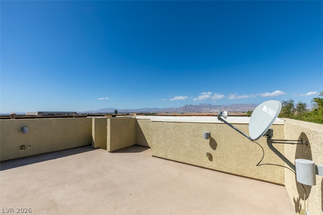 4650 Ranch House Road, Unit 46 North Las Vegas, NV 89031 - Photo 33 of 38 Panoramic mountain views stretch across the horizon from this spacious rooftop terrace.