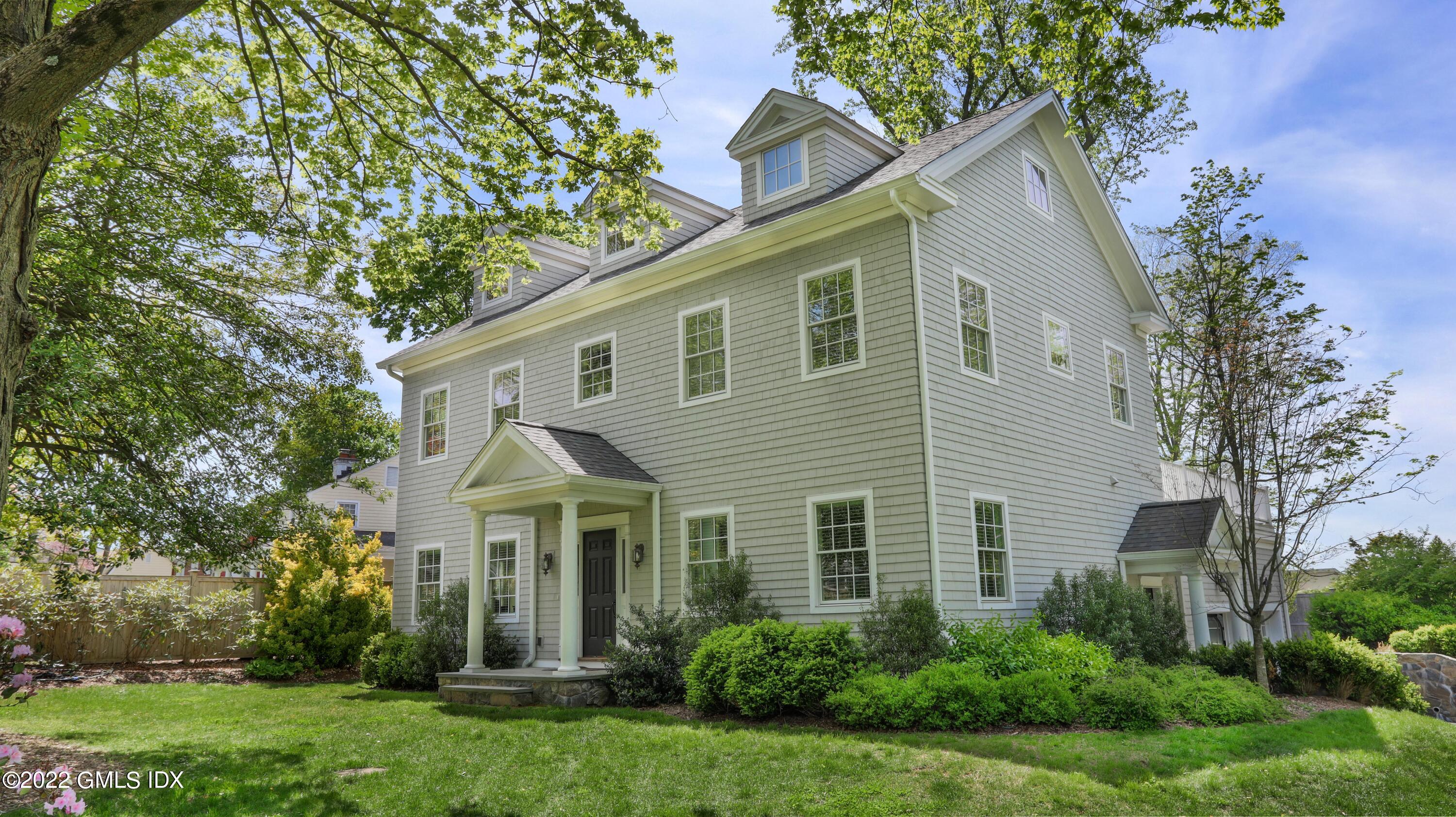 2 Pierce Road Riverside, CT 06878 - Photo 1 of 26 front view of a house with a yard