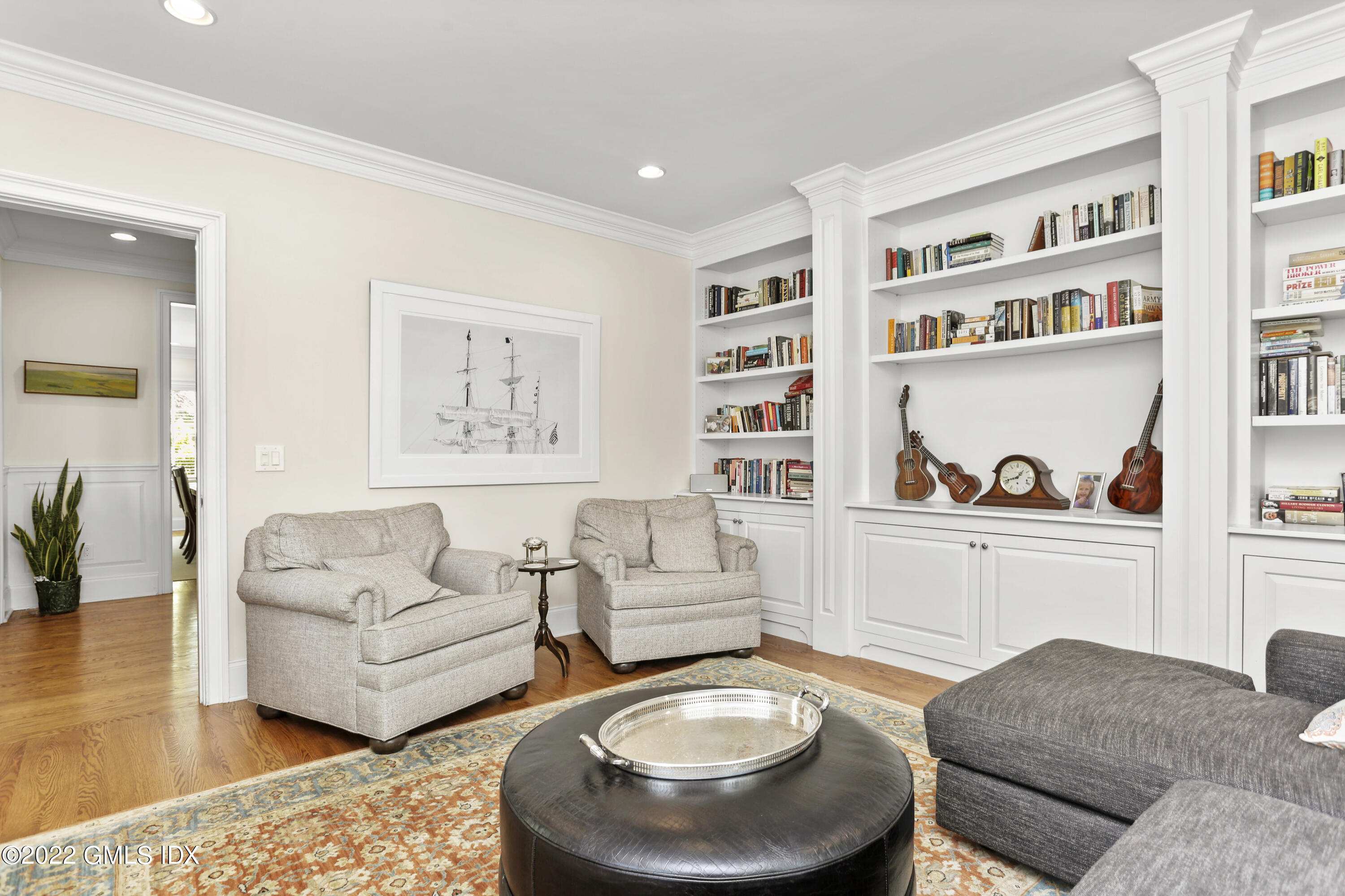 2 Pierce Road Riverside, CT 06878 - Photo 12 of 26 a living room with furniture and a book shelf