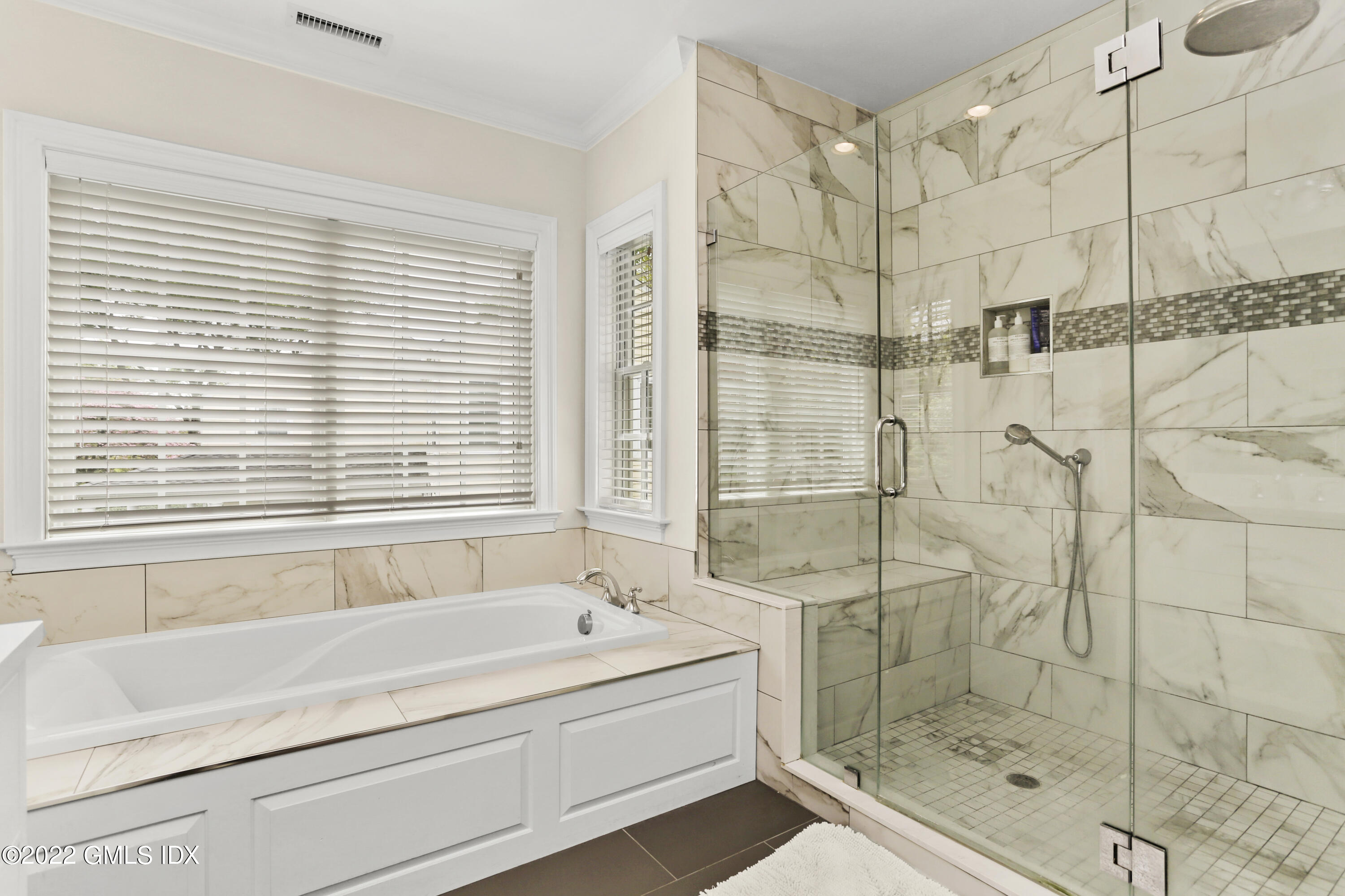 2 Pierce Road Riverside, CT 06878 - Photo 16 of 26 a bathroom with a bathtub and shower