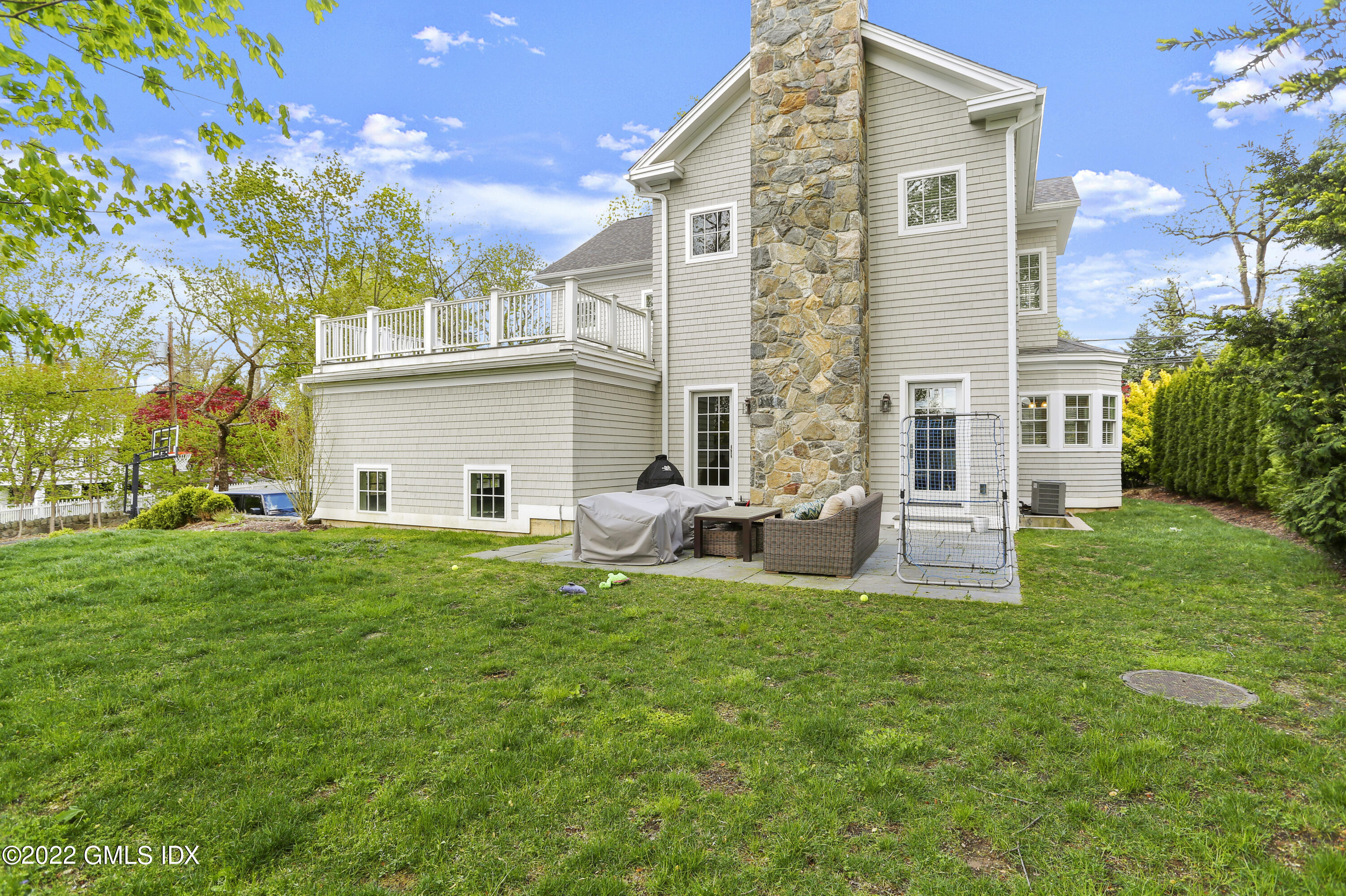 2 Pierce Road Riverside, CT 06878 - Photo 3 of 26 a view of a house with a backyard