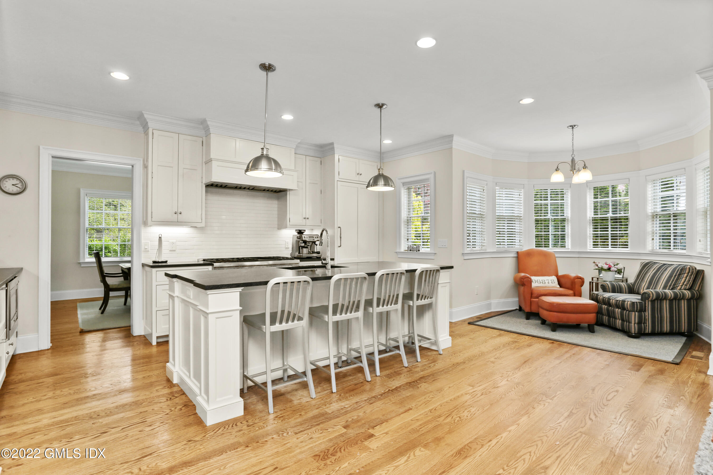 2 Pierce Road Riverside, CT 06878 - Photo 6 of 26 a large kitchen with a table and chairs