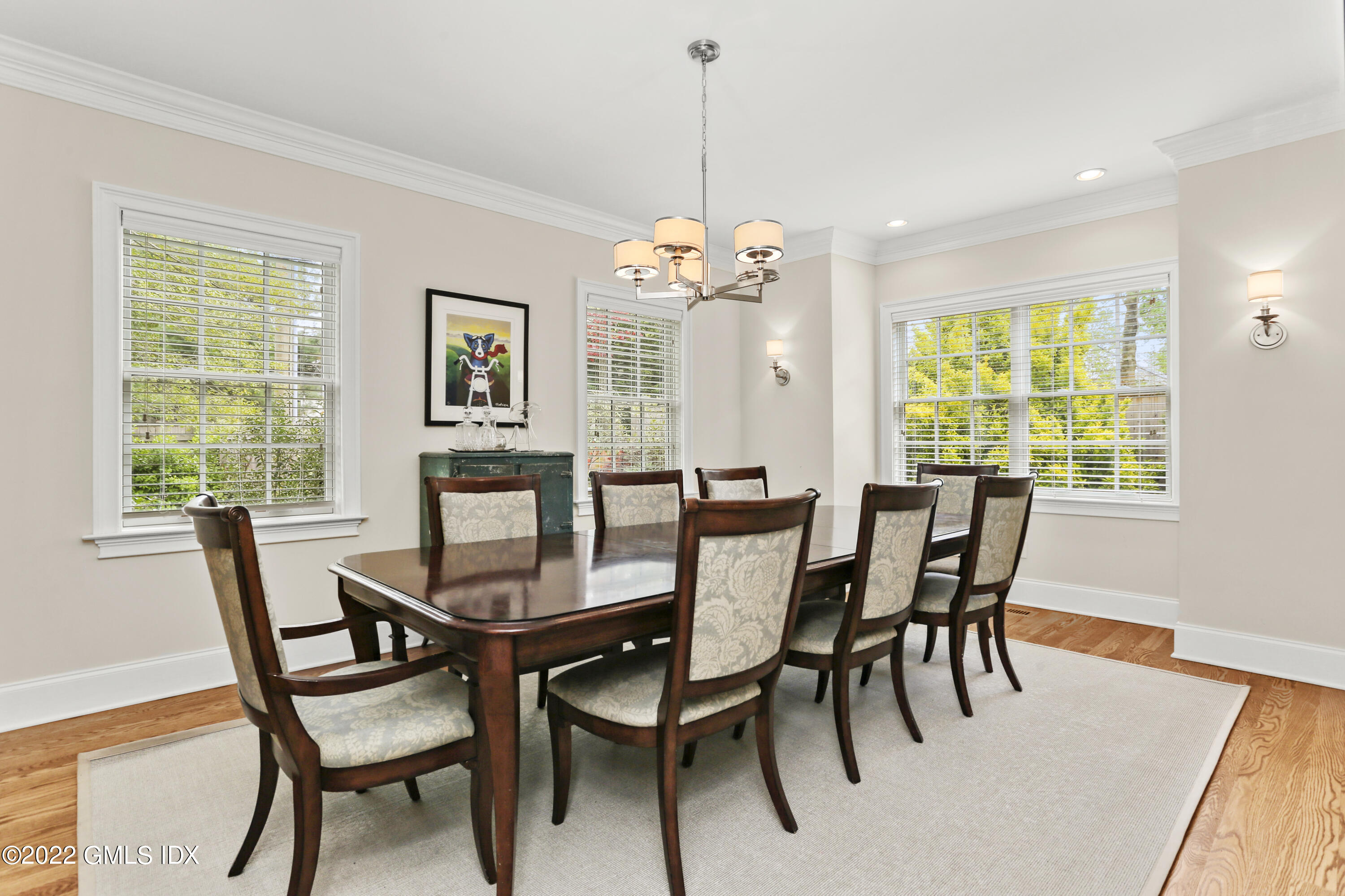2 Pierce Road Riverside, CT 06878 - Photo 10 of 26 a dining room with furniture a large window and wooden floor