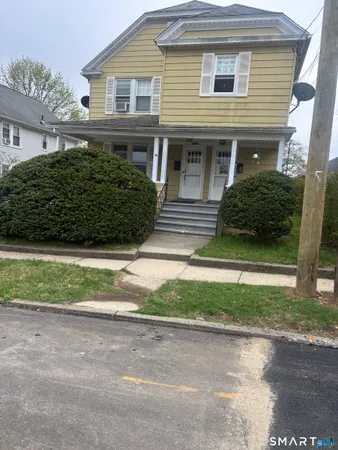 front view of a house and a yard
