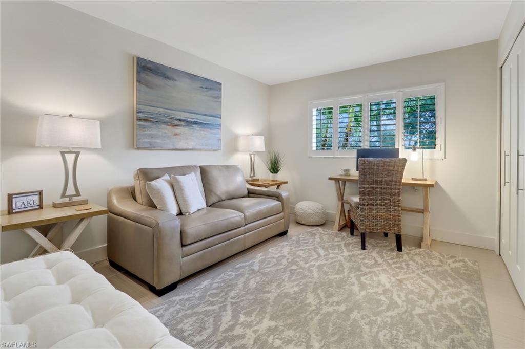 3055 Riviera Drive, Unit 201 Naples, FL 34103 - Photo 8 of 18 2nd bedroom or den has a pull out sofa
