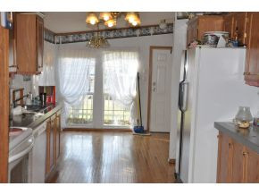 8845 Old Stage Road Limestone, TN 37681 - Photo 6 of 8 Eatin Kitch w Hardwood floors