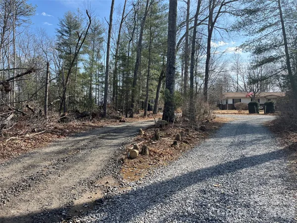 a view of road with trees