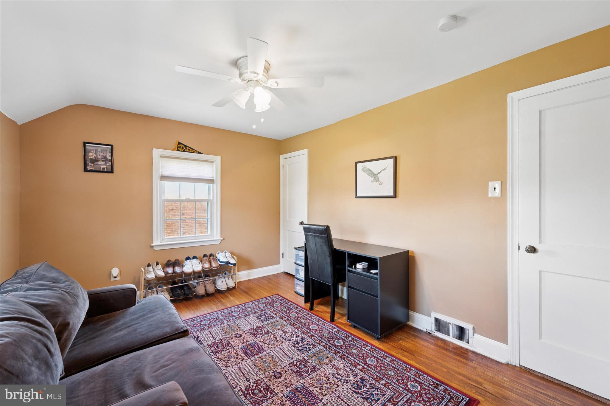313 Edgemore Road Secane, PA 19018 - Photo 14 of 22 a living room with furniture and wooden floor