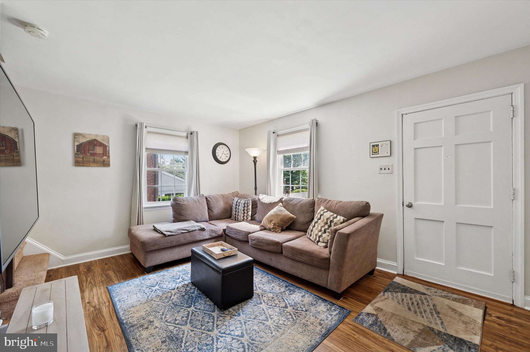 313 Edgemore Road Secane, PA 19018 - Photo 3 of 22 a living room with furniture wooden floor and lamp
