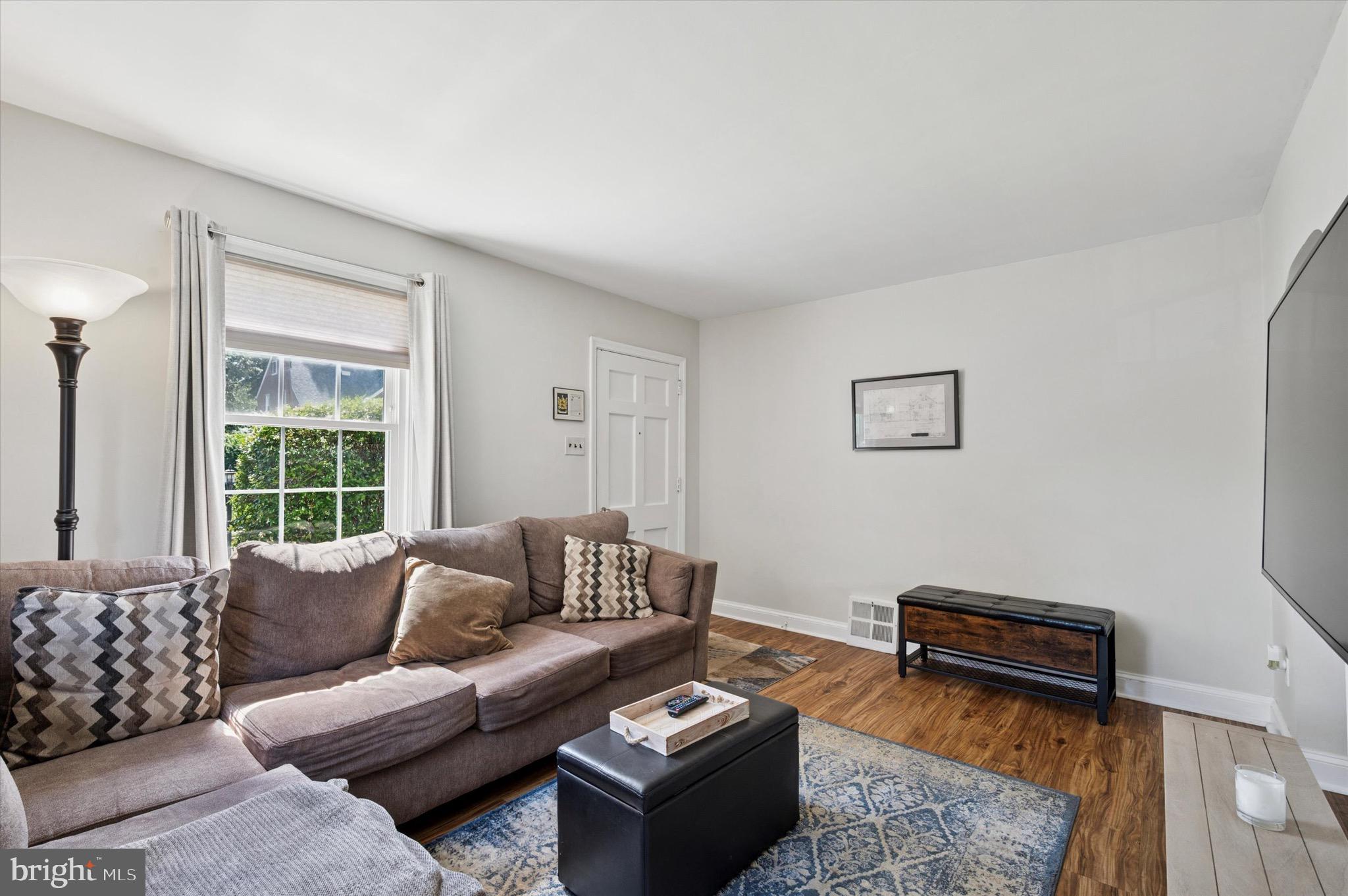 313 Edgemore Road Secane, PA 19018 - Photo 4 of 22 a living room with furniture and a window