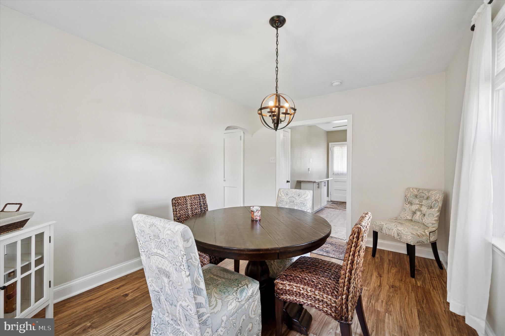 313 Edgemore Road Secane, PA 19018 - Photo 5 of 22 a view of a dining room with furniture and wooden floor