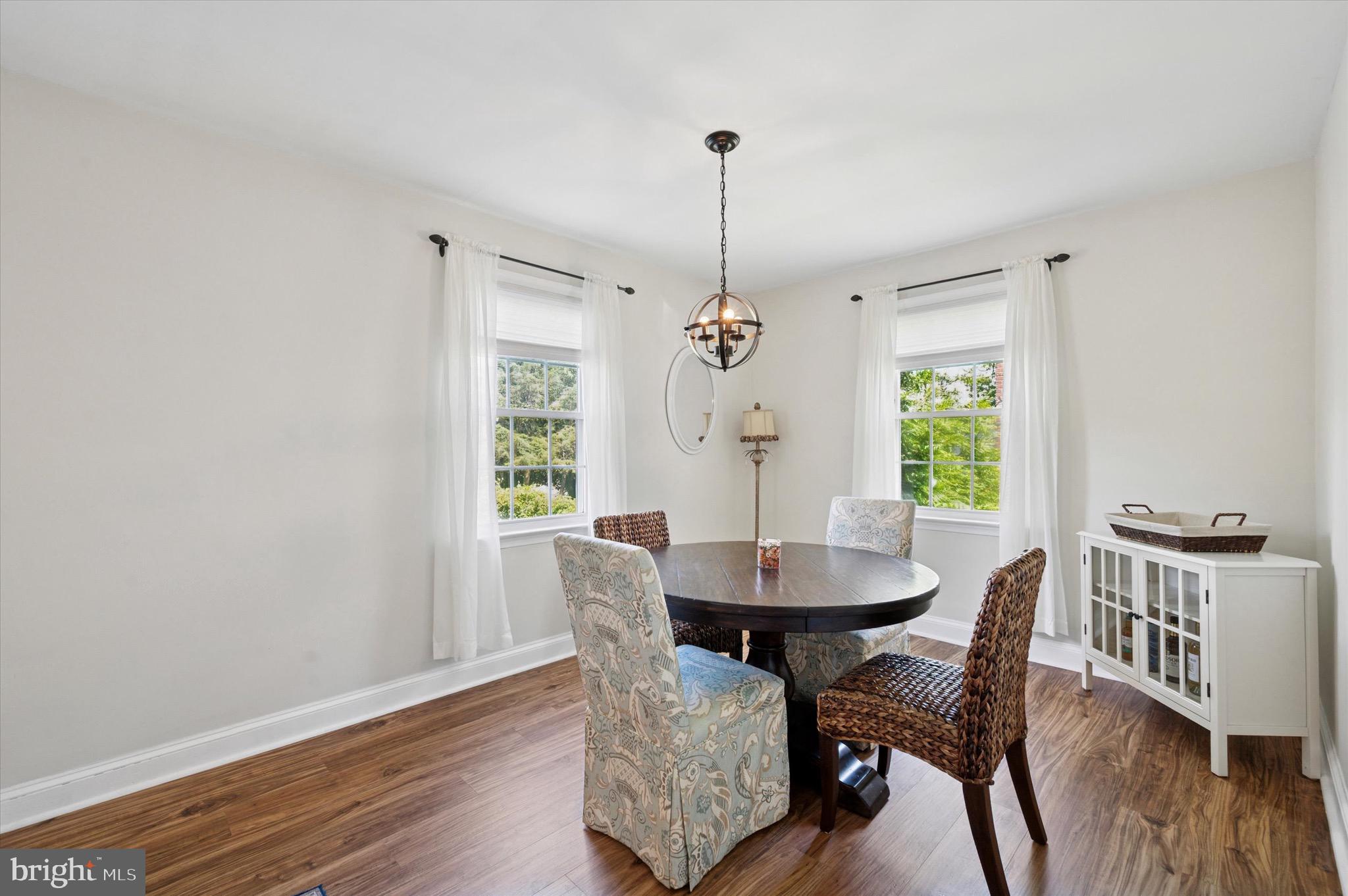 313 Edgemore Road Secane, PA 19018 - Photo 6 of 22 a view of a dining room with furniture and wooden floor